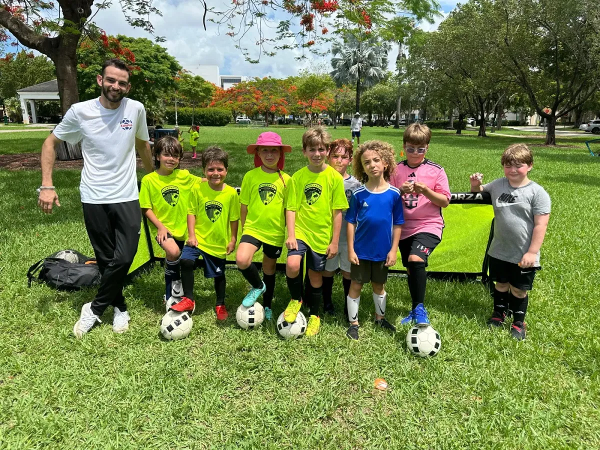 Young soccer player dribbling at KidsPro Academy Miami